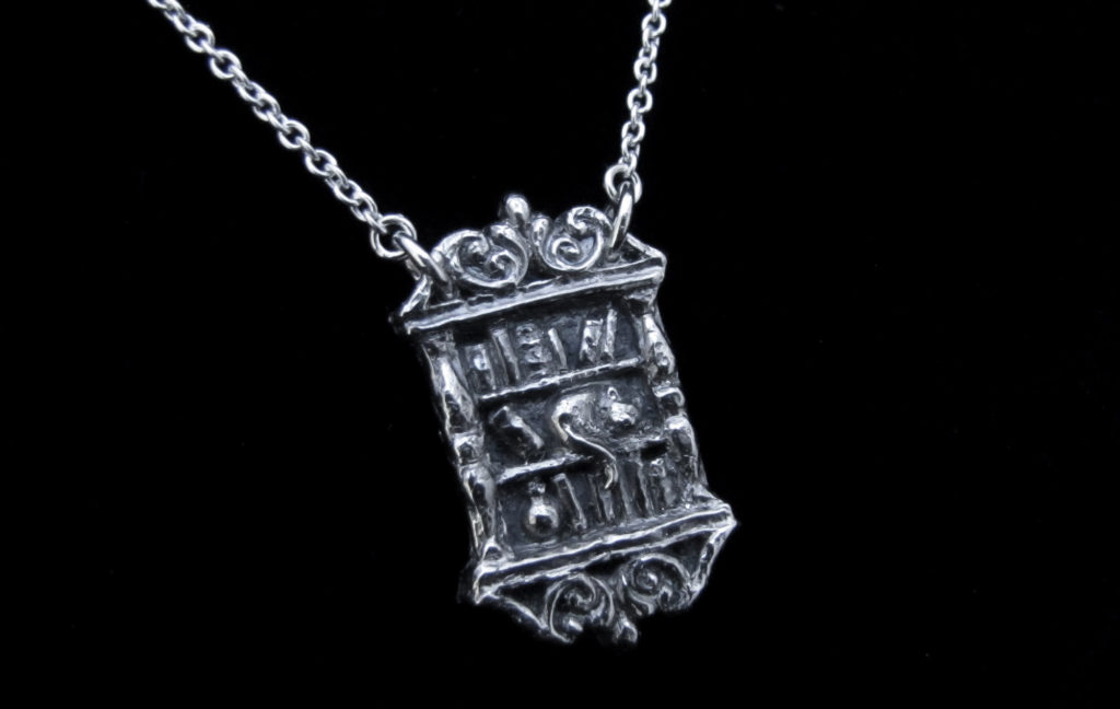 cat and bookcase PMC necklace